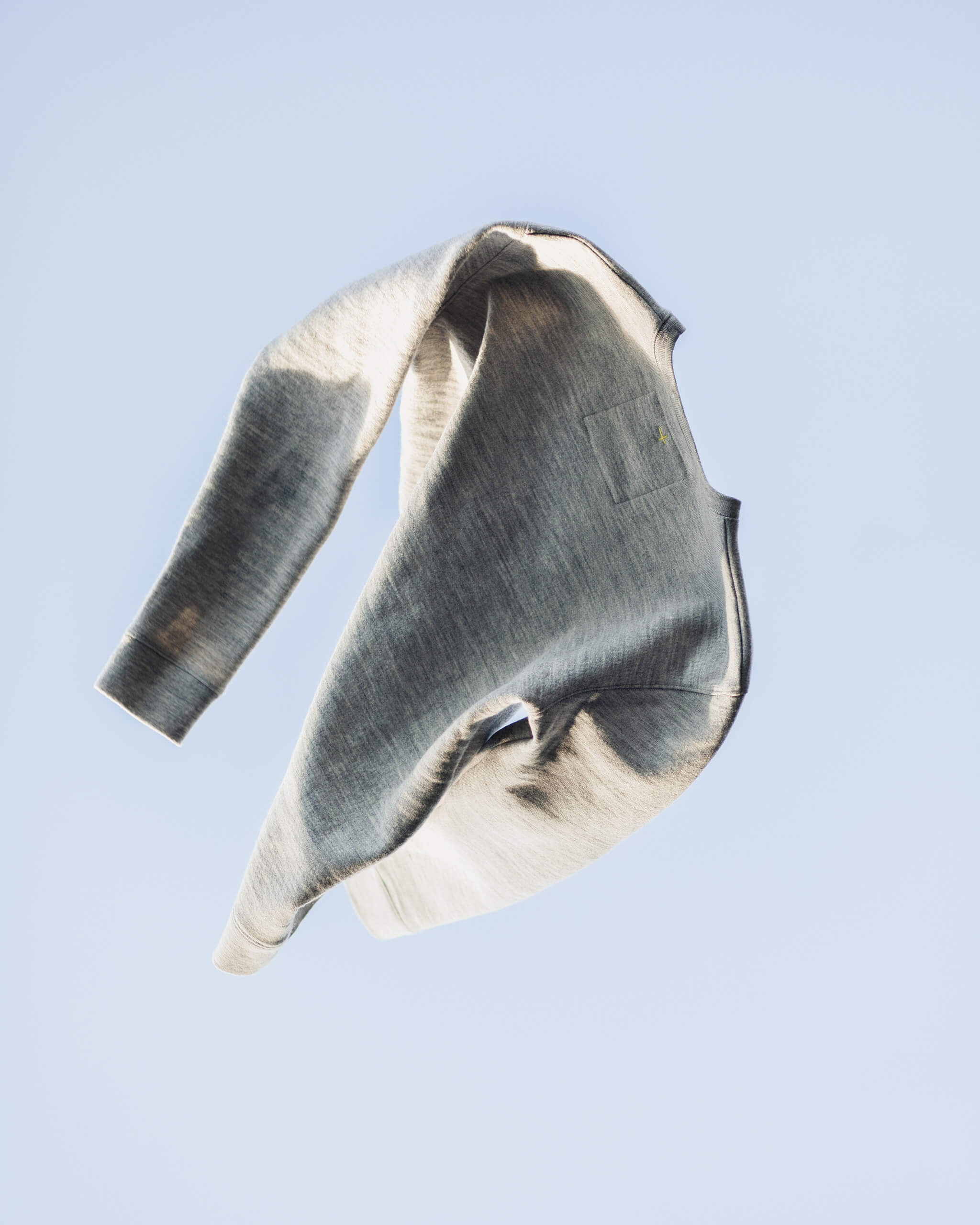 A grey sweatshirt floating in mid-air